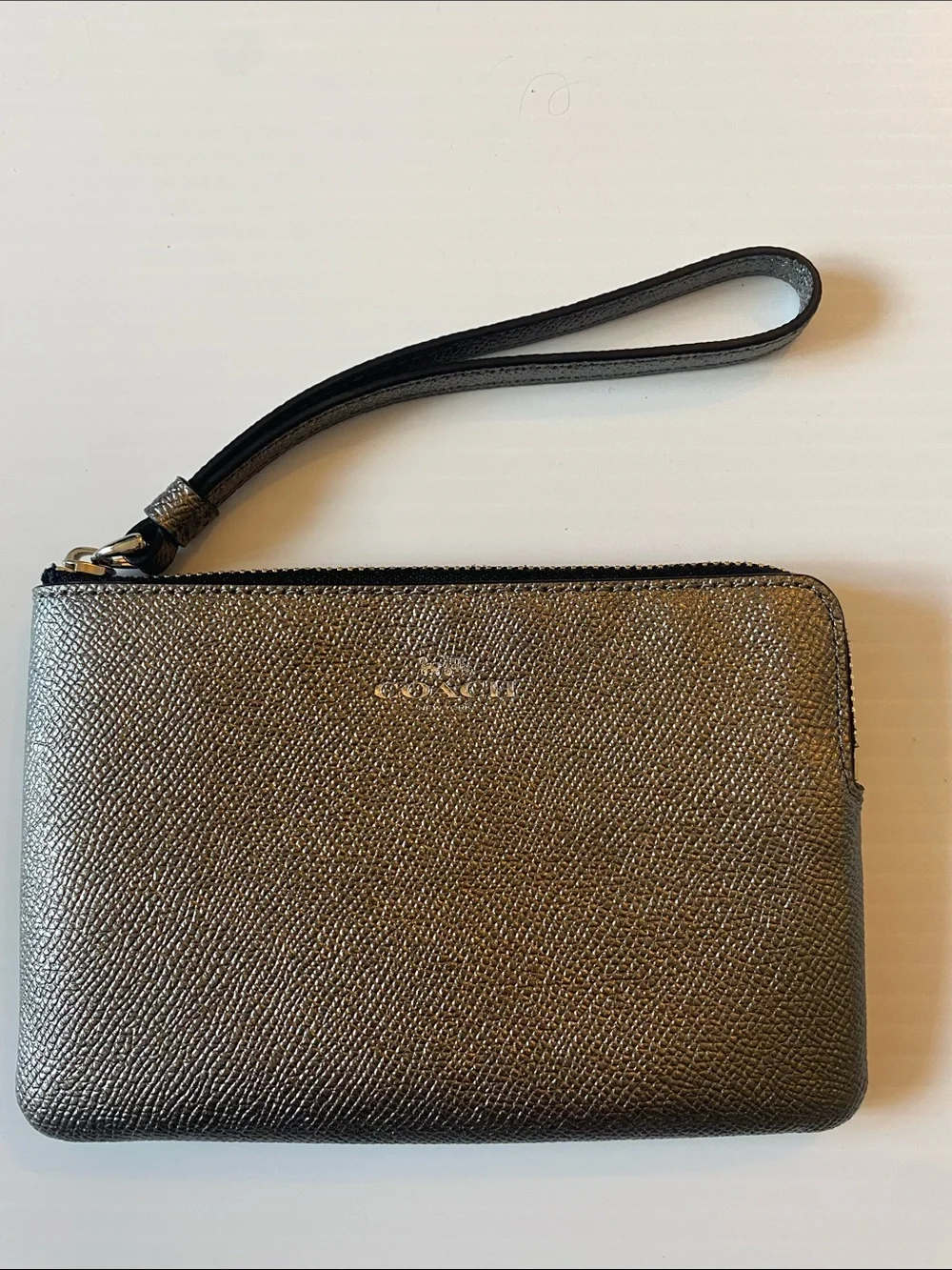 Coach Corner Zip Leather Wristlet in Silver and Black. F21070